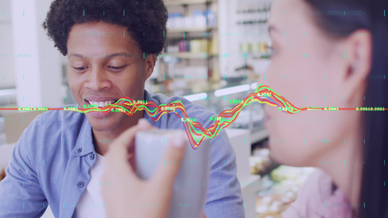 가게에서 커플이 커피를 마시는 동안 금융 데이터 처리의 애니메이션