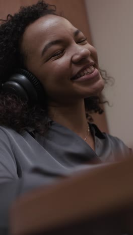 young woman listening to music