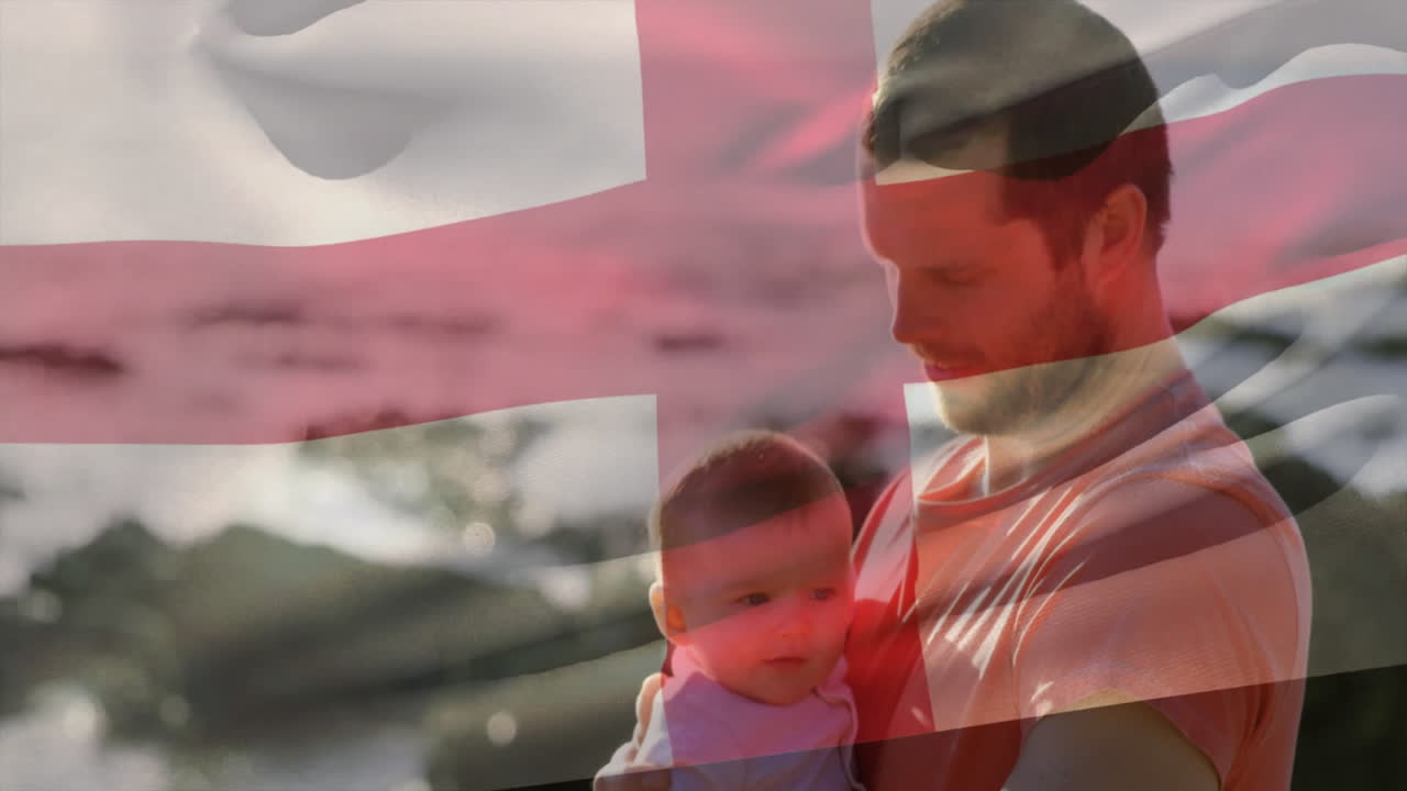 анимация флага англии над кавказским отцом и ребенком на пляже