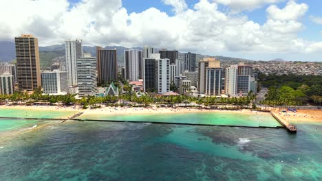 sunny tropical getaway with people relaxing on waikiki beach