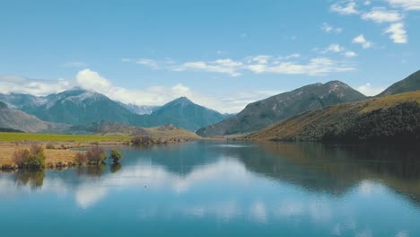 Zooming-Out-Drone-View-Of-Lake-Grasmere-Near-Cass-And-Highway-73,-New-Zealand,-Fishing-Paradise---Dolly-Shot