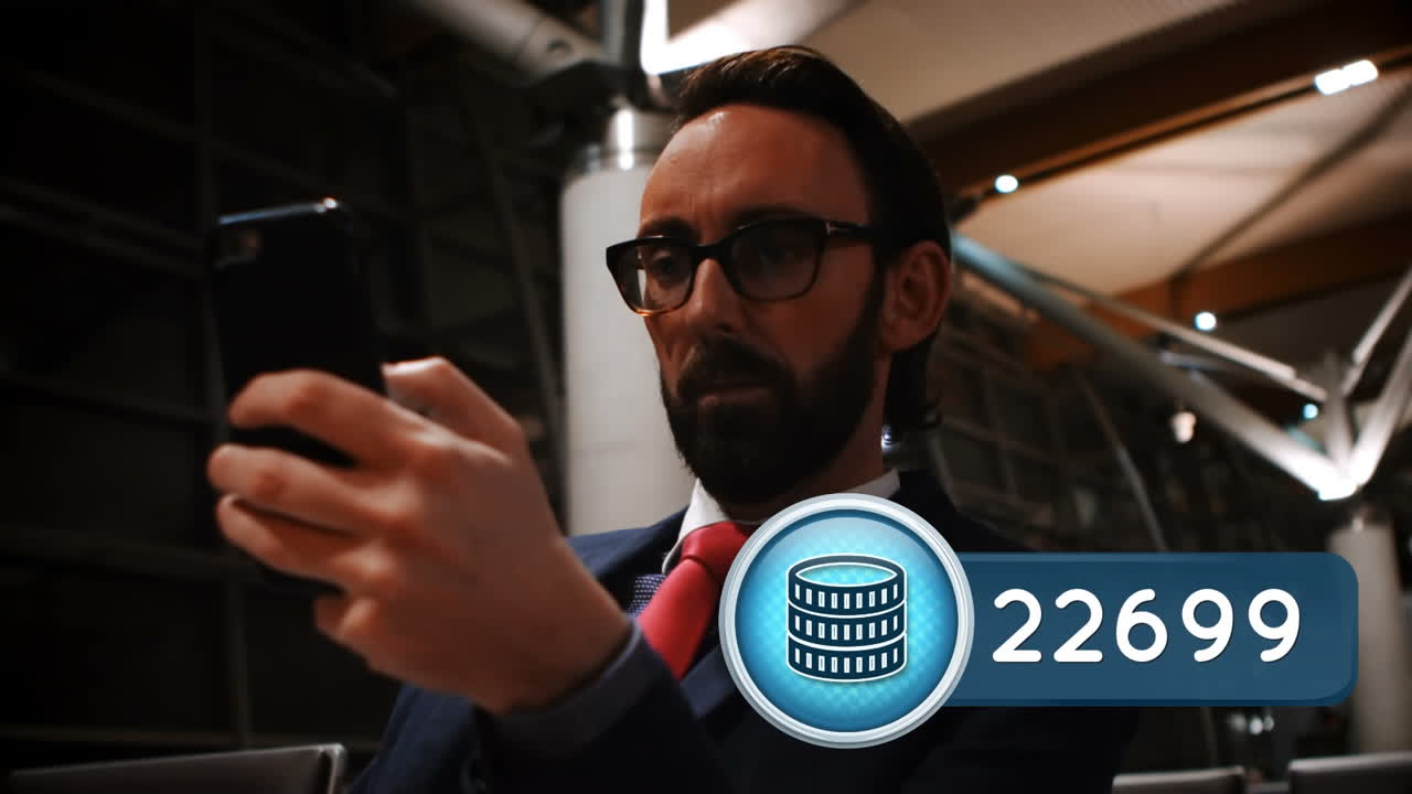 터미널 안에서 문자 메시지를 보내는 사업가