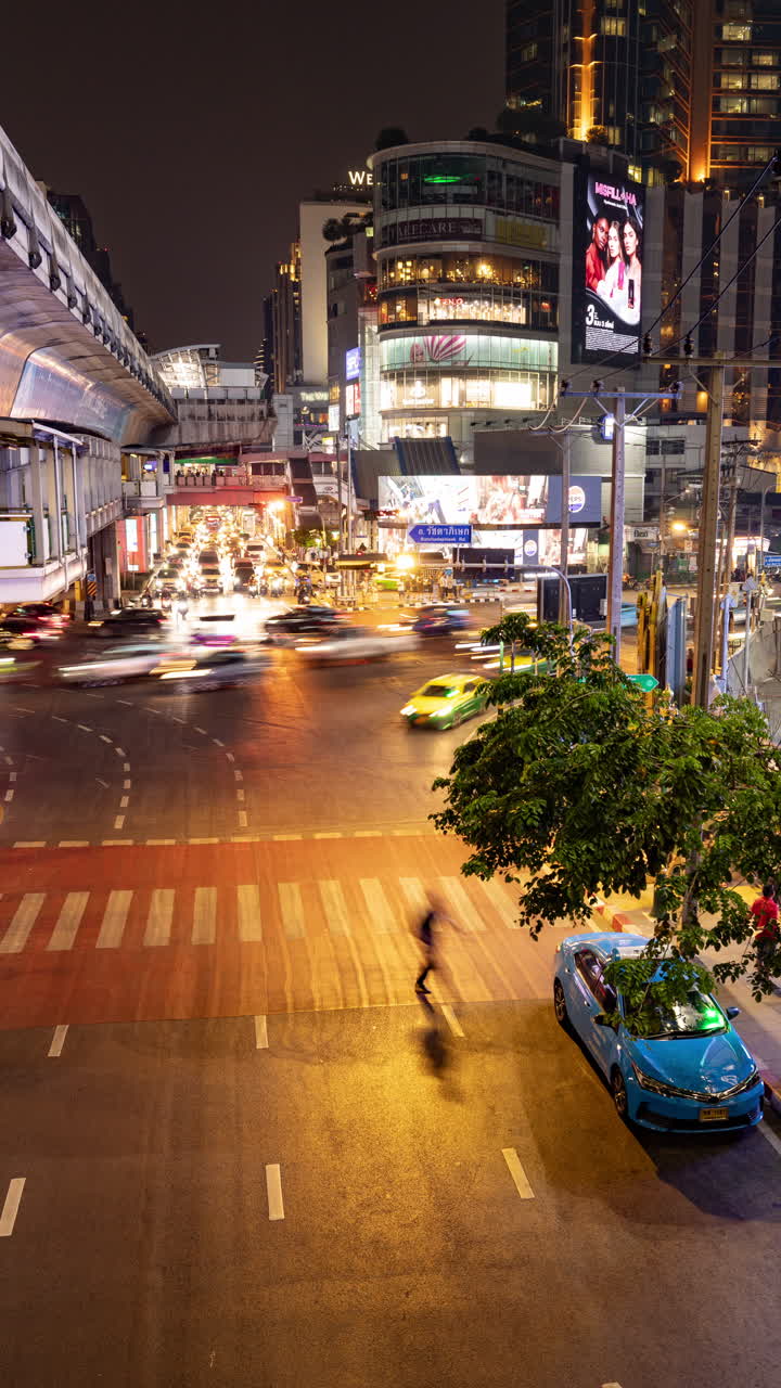 timelapse of rush hour traffic in central bangkok at night in vertical