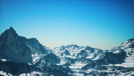 Aerial-view-of-the-Alps-mountains-in-snow