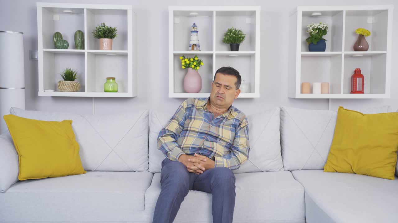 The old man who is disgusted with something.