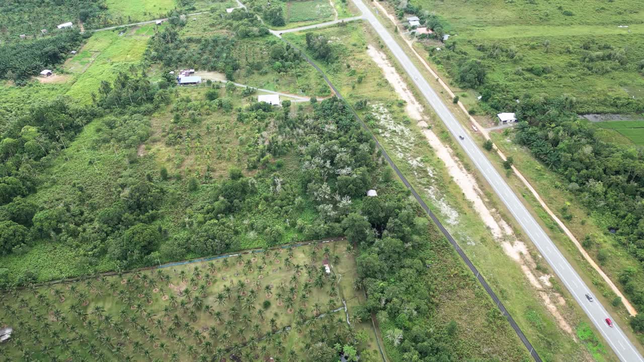 Beautiful Arieal View Of Pueh Village,Green Paddy Field Back Ground Mountain And Facing Open Sea,Kuching,Sarawak.