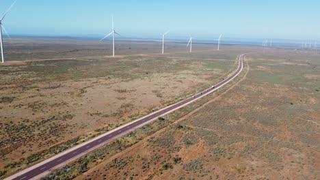 aerial drone pan shot of port augusta renewable wind solar farm climate change environment wind turbine winninowie adelaide outback south australia 4k