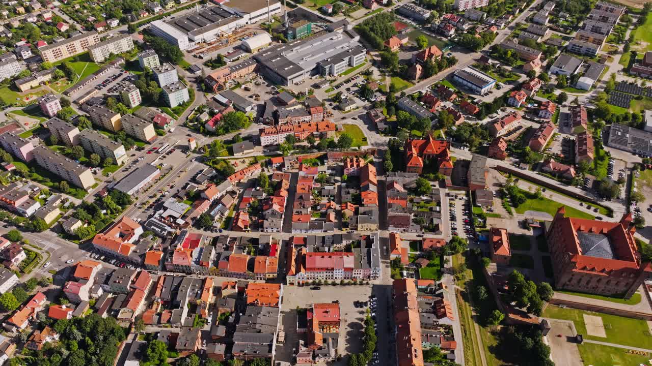 Top down shot of Gniew Poland urban pattern with red roofs and green parks