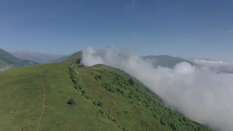 aereal drone shot location mountain, sunny weather and movement from bottom to top