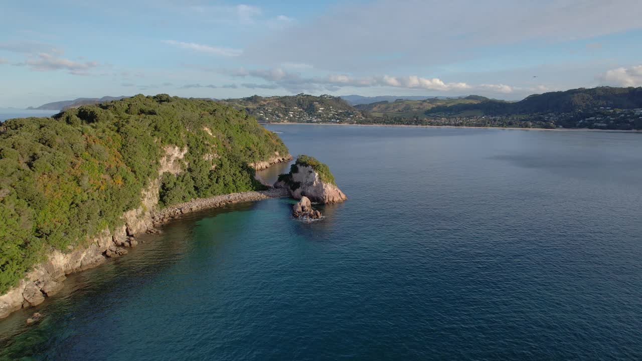 Coastal Landscape with Rocky Outcrop and Bay