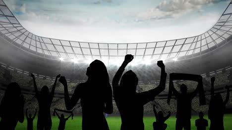 animation of silhouettes of sports fans cheering over sports stadium