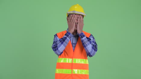 handsome multi ethnic man construction worker