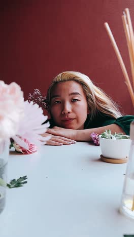 portrait of a woman with flowers and plants