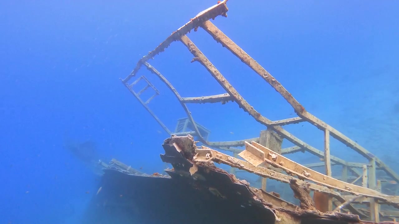 Underwater View of a Sunken Shipwreck on the Ocean Floor