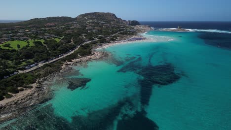 Aerial-Panorama-of-La-Pelosa-beach-lagoon-crowded-on-sunny-summer-day