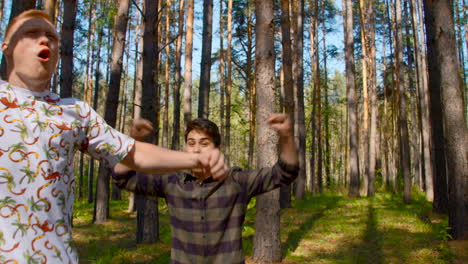 teenagers playing in the forest