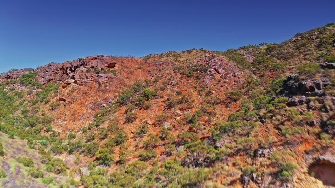 West Australian Desert Canyon Aerial Drone low fly up and over valley in Exmouth