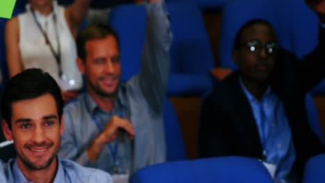 business executives show their approval by raising hands