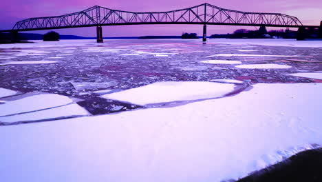 aerial video capturing the expanse of colossal ice formations drifting in the water