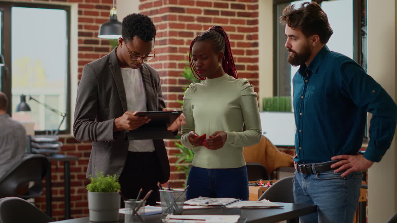 Diverse team of people doing teamwork to plan report analysis