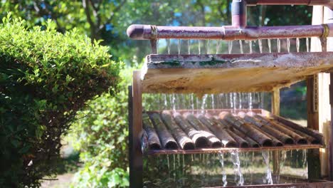 geothermal water boiling and cooling over bamboo in beppu, oita