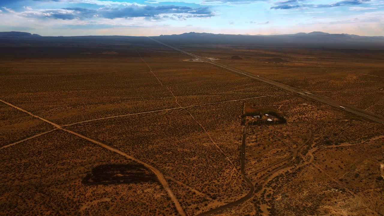 Vast panorama of a dry desert in Nevada, USA. Dull scenery of a deserted landscape from top view.