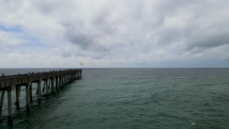 Pensacola-Beach-Fishing-pier-on-Casino-Beach-in-Florida---Aerial-Drone-Flying-View