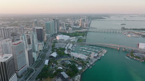 aerial panoramic view of sea bay with modern tall apartment buildings on waterfront. city at dusk. miami, usa