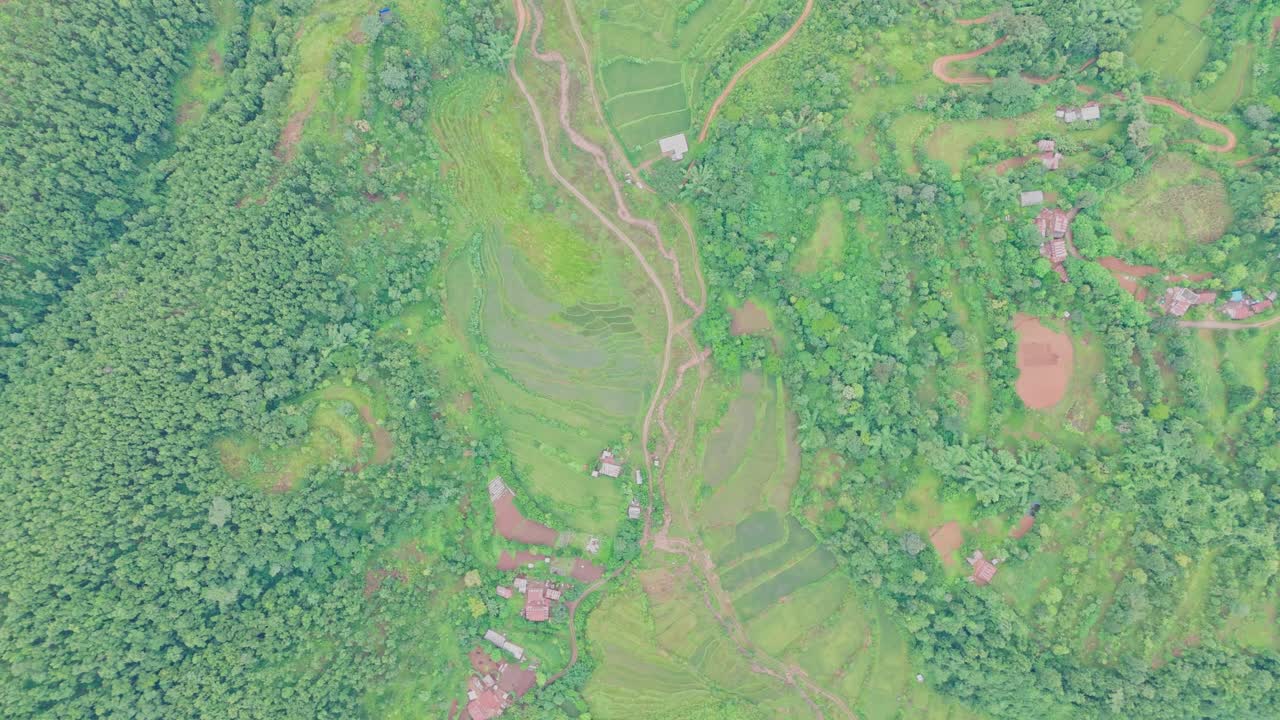 Beautiful hillside view of Tansen Palpa, Nepal, showcasing green mountains, traditional houses, and the peaceful charm of this historic hill town surrounded by nature