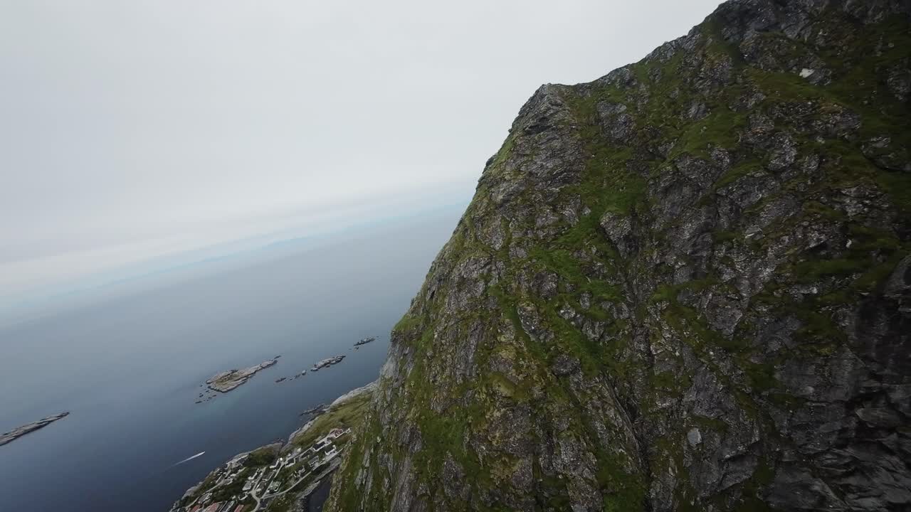 filmación cinematográfica fpv drone estabilizada desde lofoten revelando reine noruega