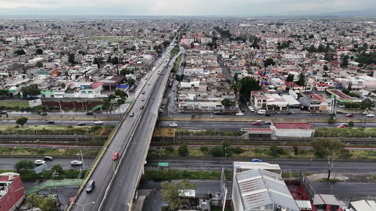 Aerial View of a City in Mexico with Highway and Densely Populated Residential Area