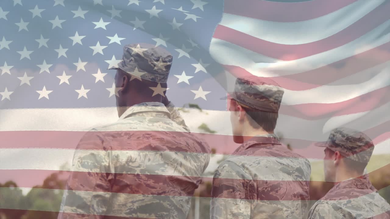 Three service members standing, center raising arm saluting while flag overlay rippling, honoring