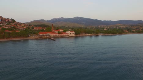 aerial: the town of molyvos on lesbos island during sunset