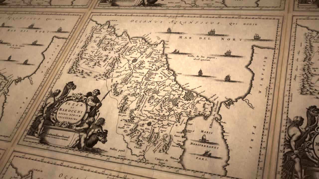 Antique map of Morocco with ornate border and sea illustrations