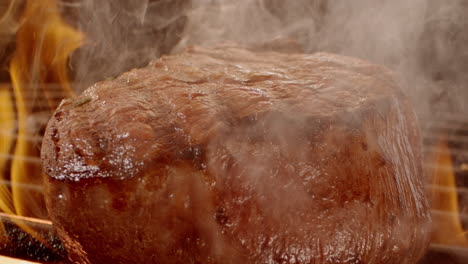 grilled steak cooking on a grill