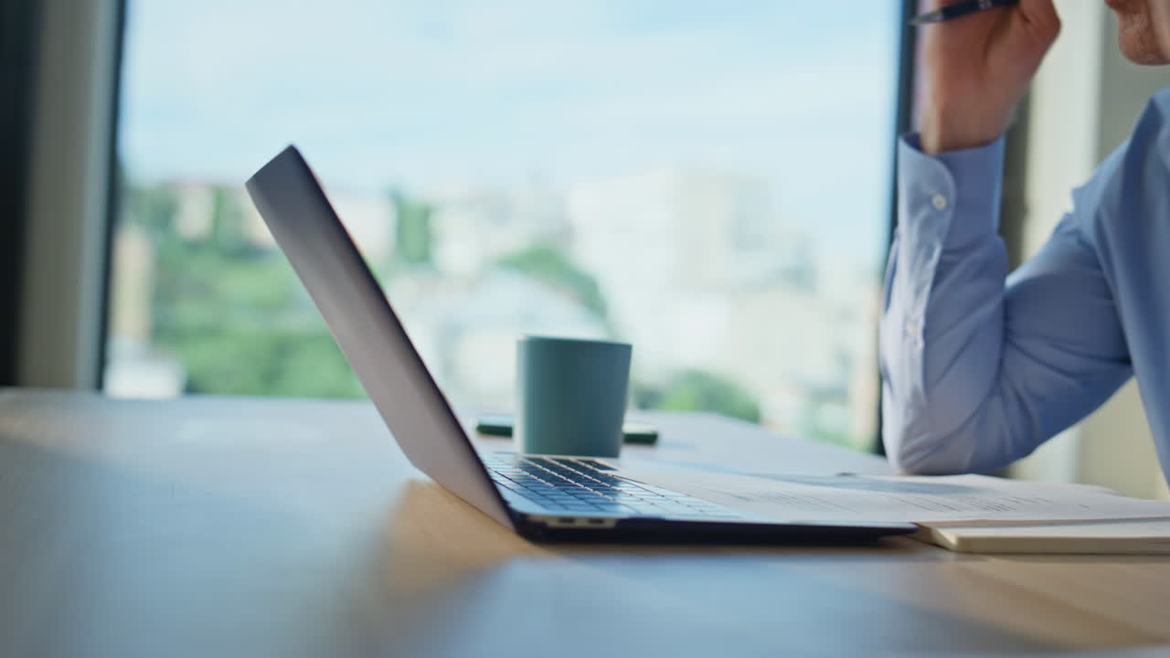 Creative manager video calling explaining business ideas in home office closeup