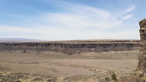 passing near a big rock in frenchman coulee, washington state, usa