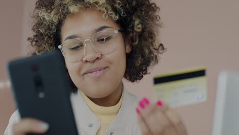 woman shopping online with credit card