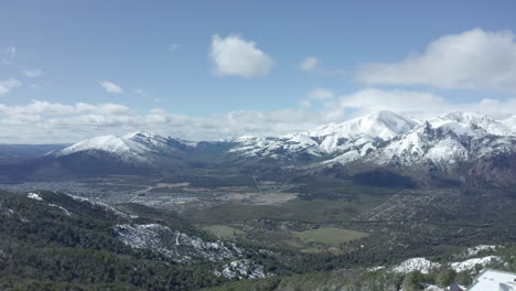 AERIAL---Snowy-Cerro-Otto-and-Andes-Mountains,-Patagonia,-Argentina,-spinning-shot