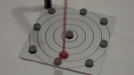 randomly oscillating magnetic pendulum in motion