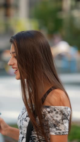 young woman enjoying coffee outdoors