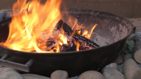 Timelapse-of-a-fire-going-through-the-stages-for-a-barbeque