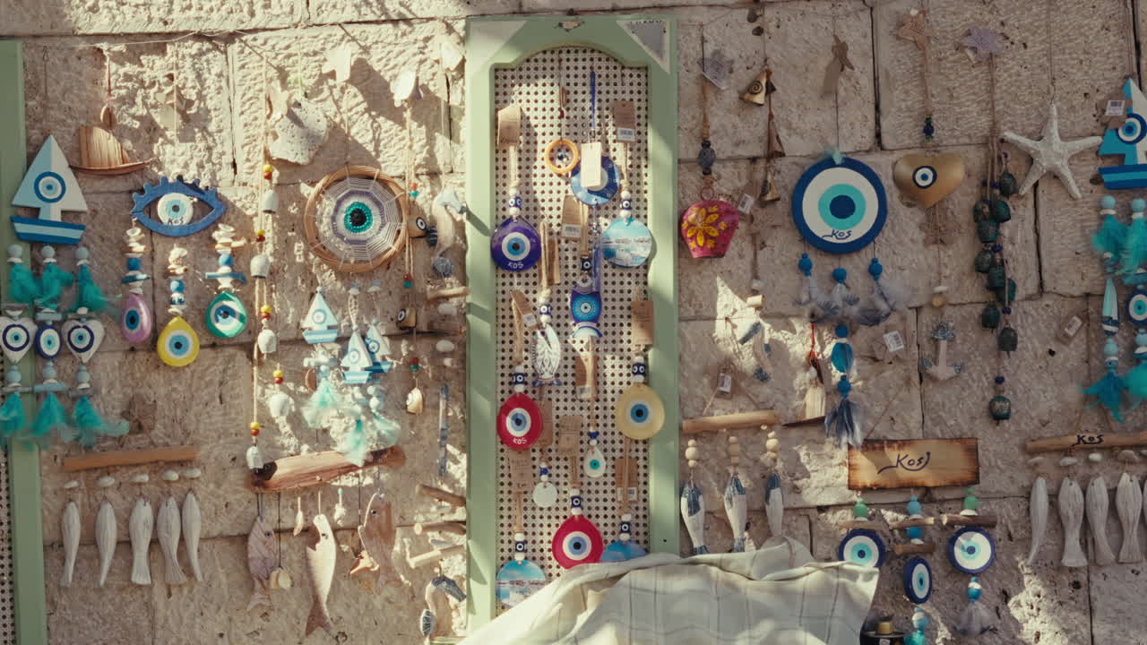 Colorful Souvenir Display on a Stone Wall
