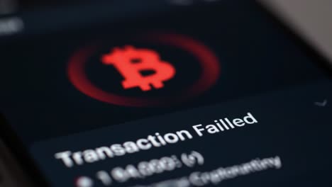a mobile screen displays a failed bitcoin transaction notification, indicating problems with the network and lack of necessary confirmations. users face frustration with cryptocurrency.