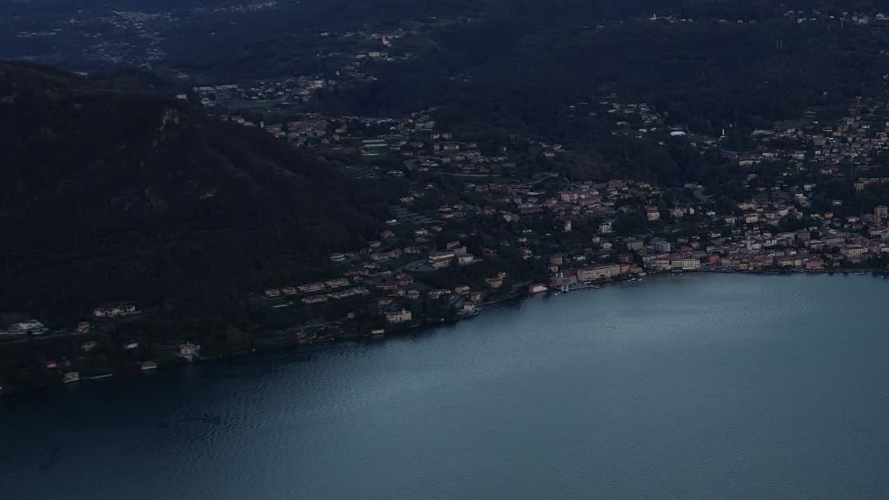 Breathtaking aerial view of the Italian Alps near a tranquil lake