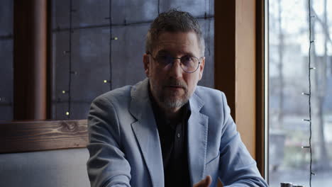man sitting in a cafe