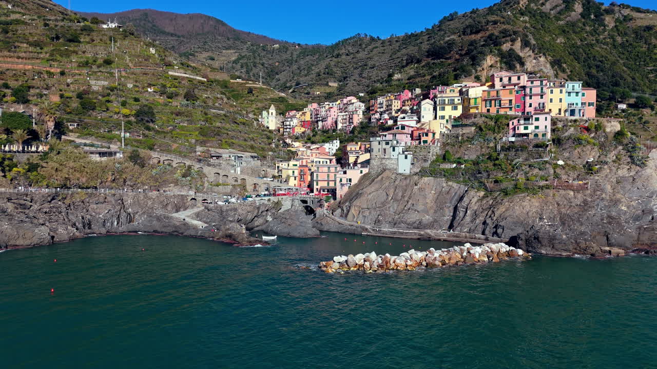 Vibrant coastal village of Manarola, Cinque Terre, Italy, perched on rocky cliffs