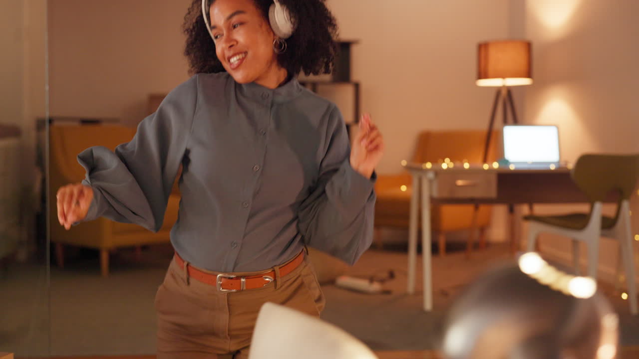 Happy woman, headphones and dancing in office