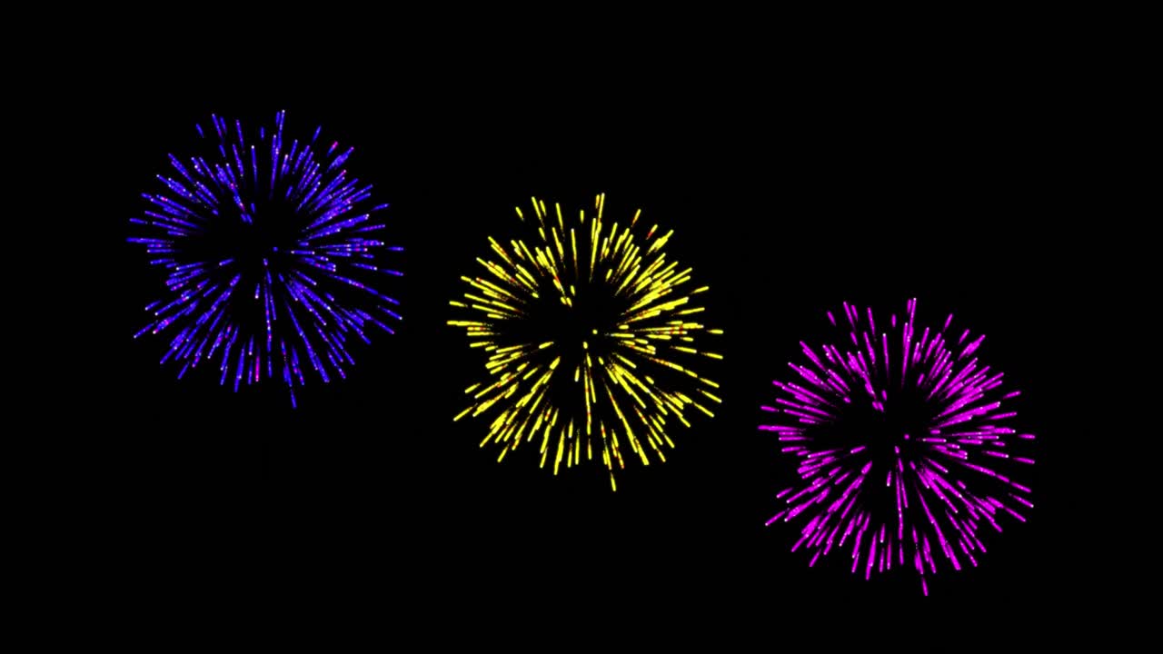 Animazione di fuochi d'artificio colorati di Natale e Capodanno che esplodono su sfondo nero.