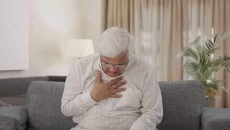 Sick-Indian-old-man-suffering-from-cold-and-cough